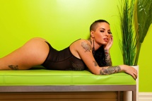 Hottie Christy Mack is rocking her black bodysuit showing of her amazing ass