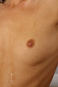 Naughty babe Gina catches her piss in a glass vase